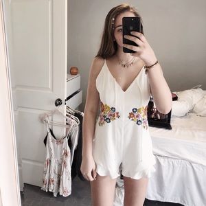 romper with flower detail